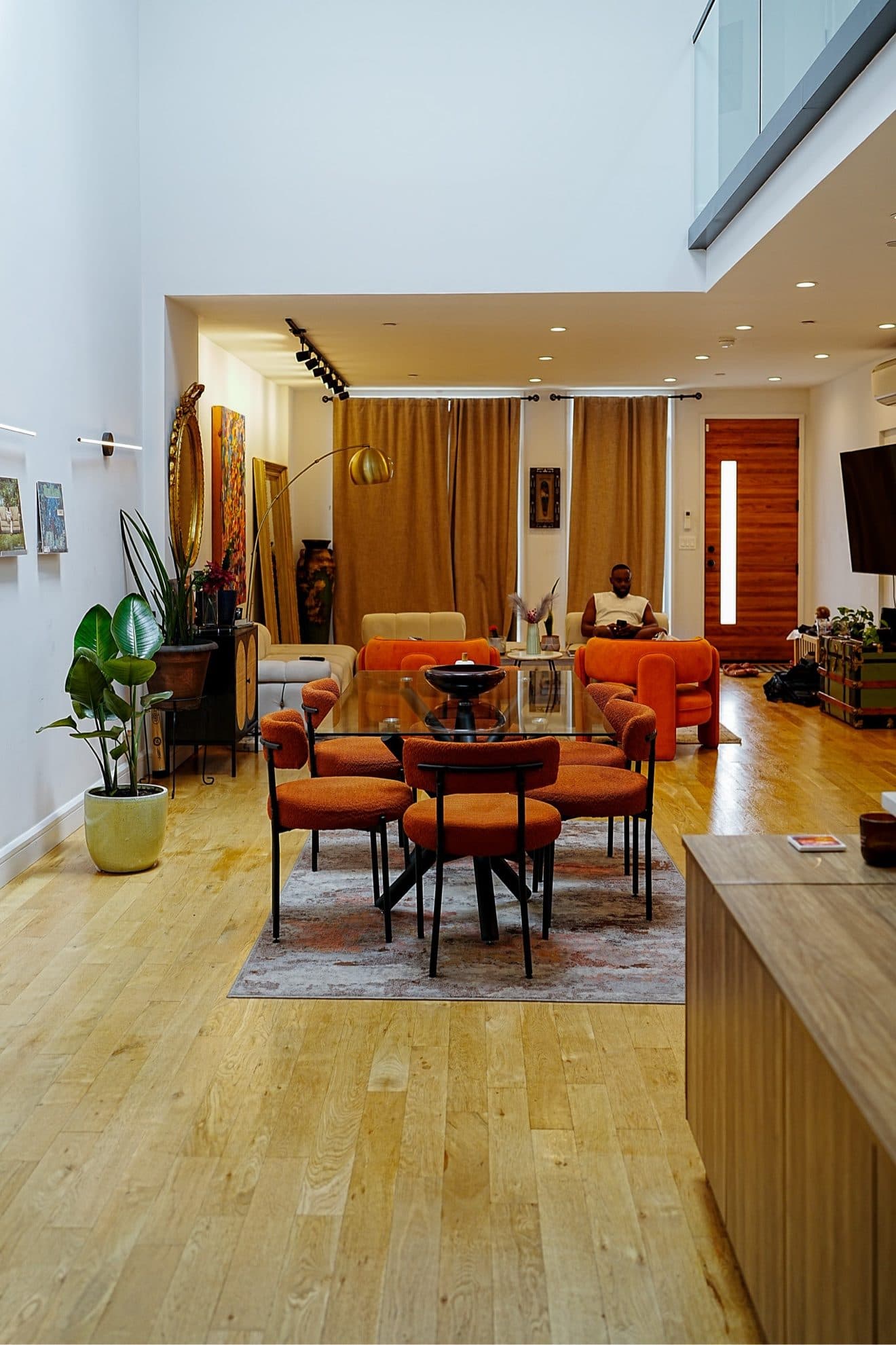 Double-height living space of Golden Hour Loft with mezzanine